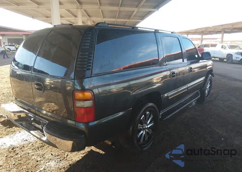 2003 Chevrolet Suburban 1500 Ls z USA, uszkodzony, nr VIN 1GNEC16T63J237764